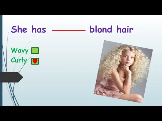 She has blond hair Wavy Curly