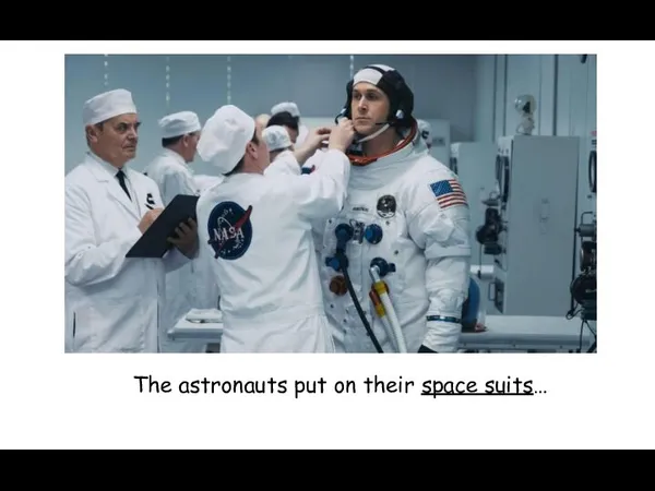 The astronauts put on their space suits…