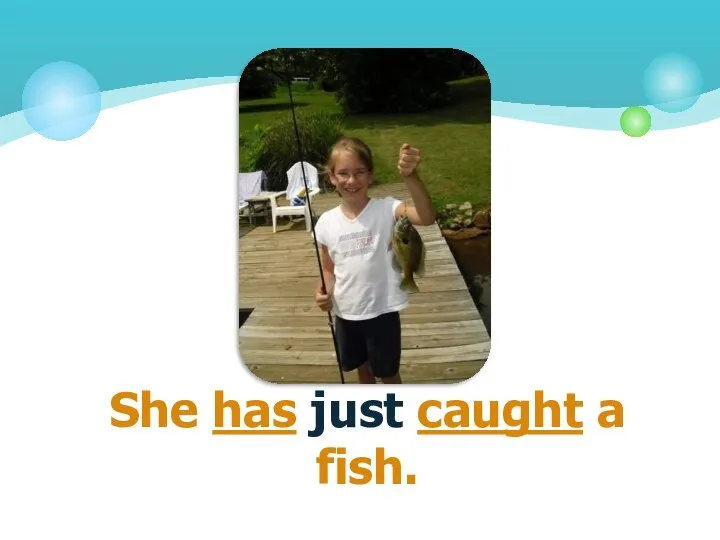 She has just caught a fish.