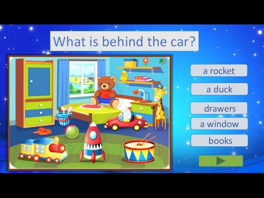 drawers a duck a rocket a window books What is behind the car?