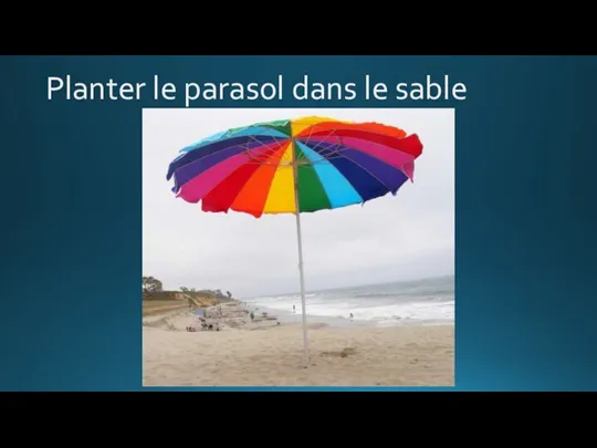 Planter le parasol dans le sable