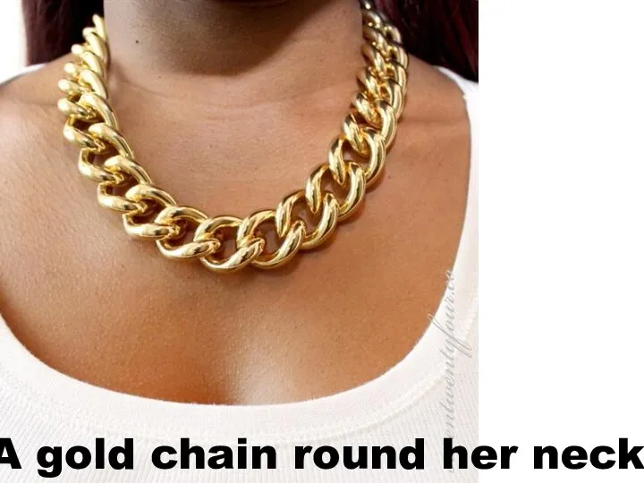 A gold chain round her neck
