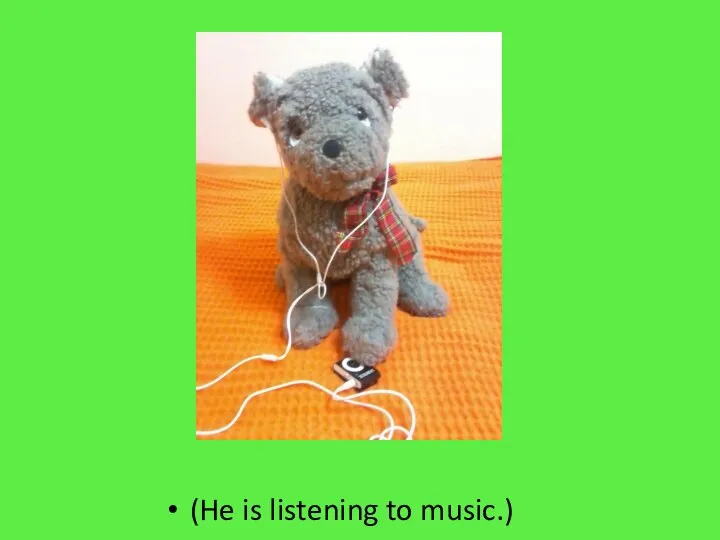 (He is listening to music.)