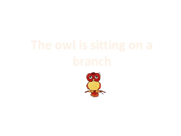 The owl is sitting on a branch