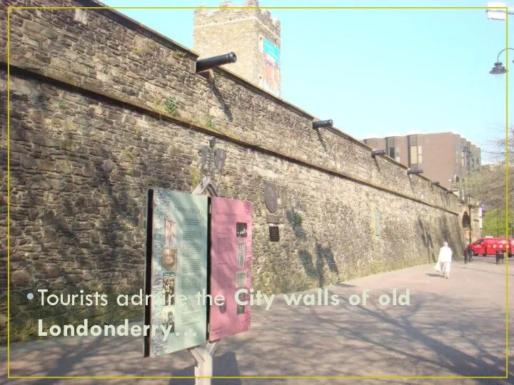 Tourists admire the City walls of old Londonderry…