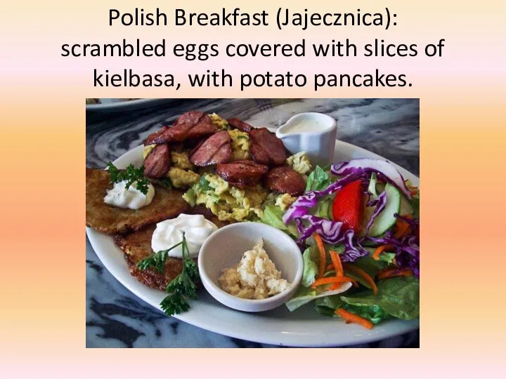 Polish Breakfast (Jajecznica): scrambled eggs covered with slices of kielbasa, with potato pancakes.