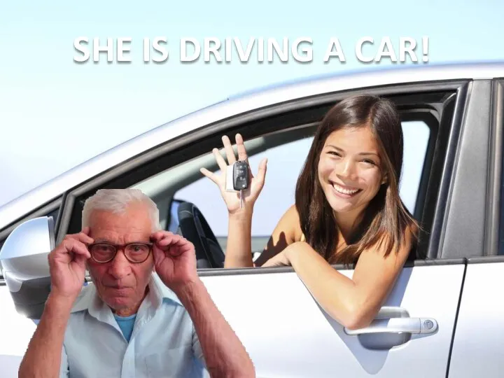SHE IS DRIVING A CAR!
