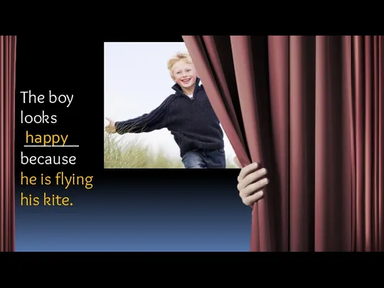 happy The boy looks ______ because he is flying his kite.