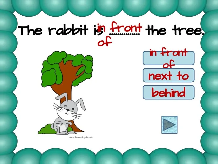 The rabbit is …………… the tree. in front of next to behind in front of