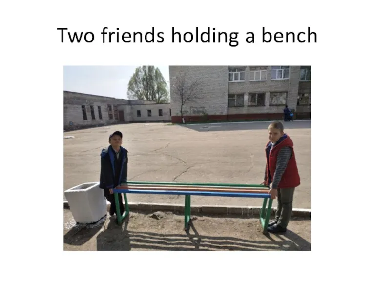 Two friends holding a bench