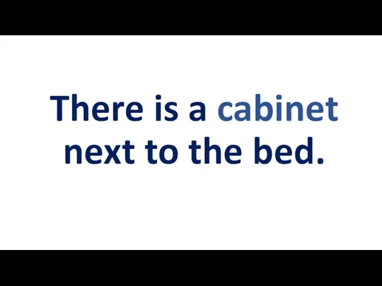 There is a cabinet next to the bed.