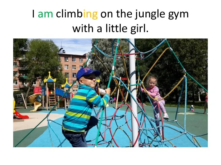 I am climbing on the jungle gym with a little girl.