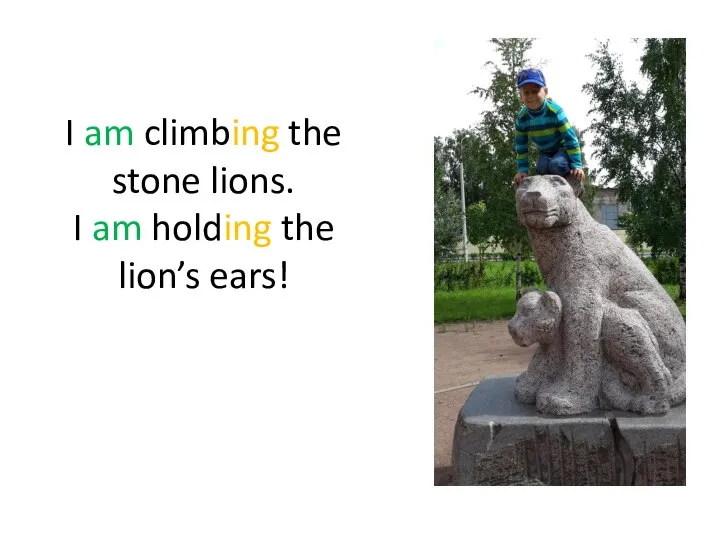 I am climbing the stone lions. I am holding the lion’s ears!