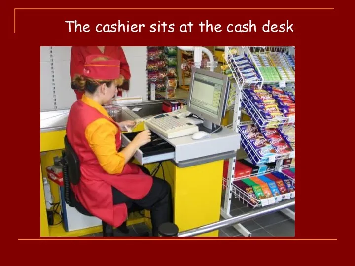 The cashier sits at the cash desk