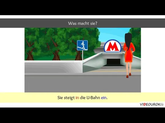 Was macht sie? Sie steigt in die U-Bahn ein.