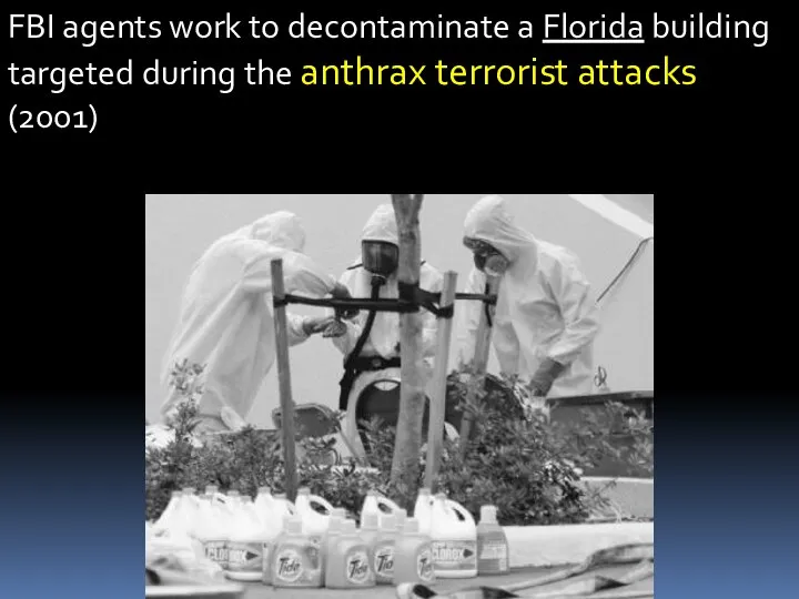 FBI agents work to decontaminate a Florida building targeted during the anthrax terrorist attacks (2001)