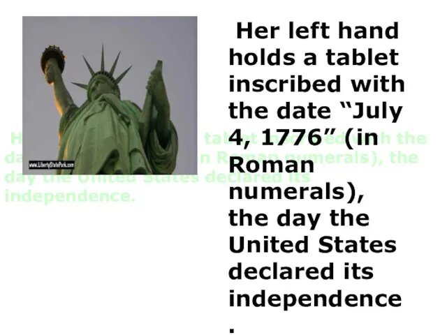 Her left hand holds a tablet inscribed with the date “July 4,