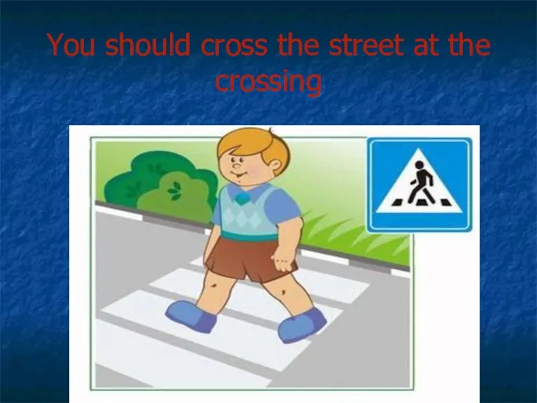 You should cross the street at the crossing