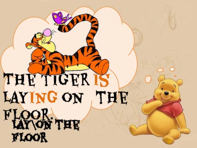 The tiger is laying on the floor. Lay\on the floor