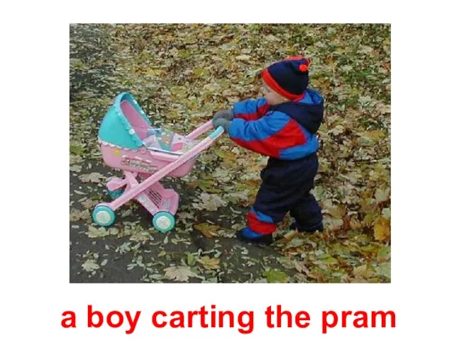 a boy carting the pram