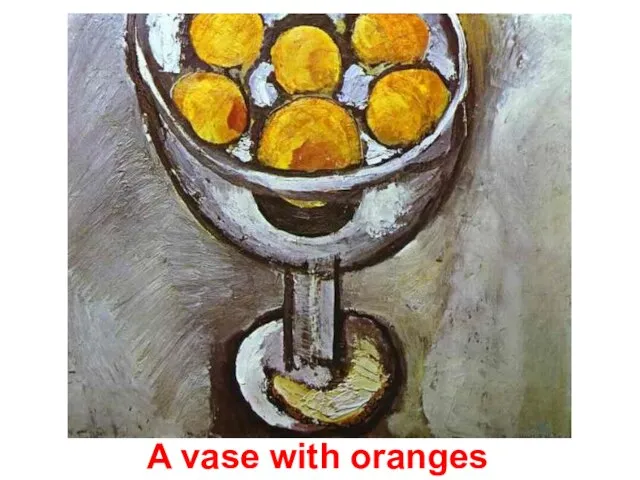 A vase with oranges