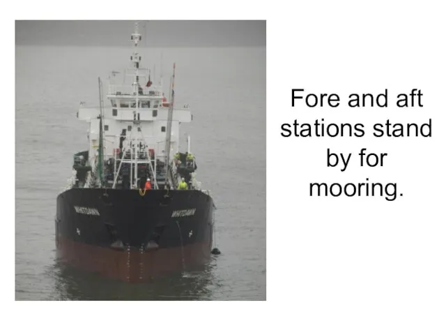 Fore and aft stations stand by for mooring.