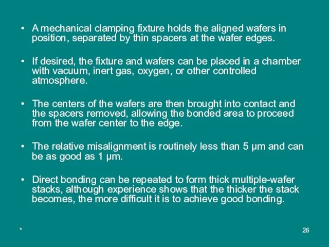 * A mechanical clamping fixture holds the aligned wafers in position, separated