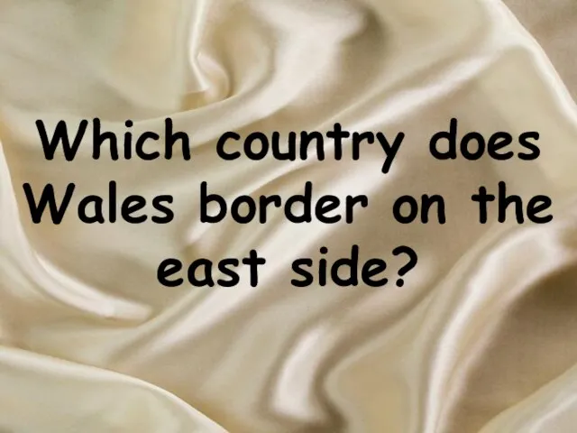 Which country does Wales border on the east side?