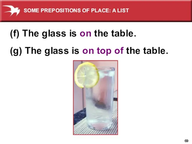 (f) The glass is on the table. (g) The glass is on