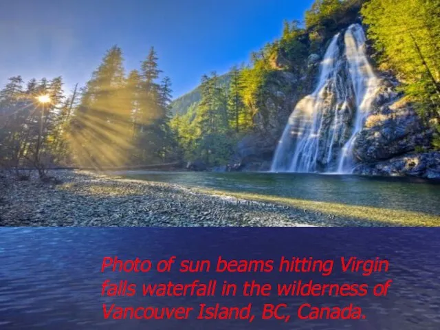 Photo of sun beams hitting Virgin falls waterfall in the wilderness of Vancouver Island, BC, Canada.