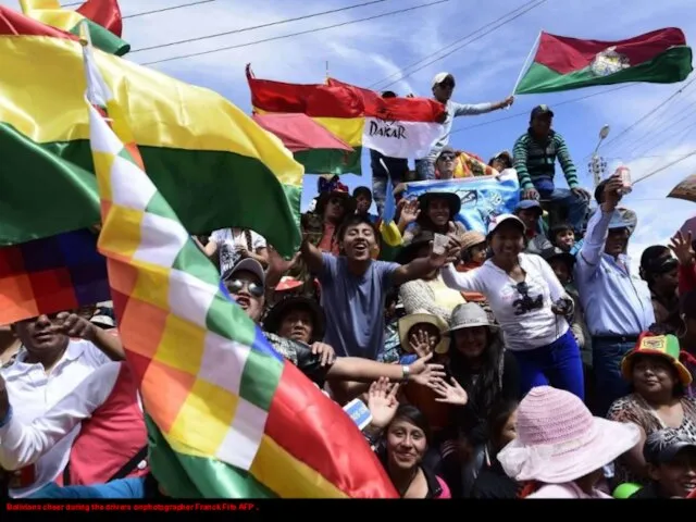 Bolivians cheer during the drivers onphotographer Franck Fife AFP .