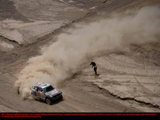 Mini's Nasser Al-Attiyah of Qatar and co-driver Mathieu Baumel of France compete