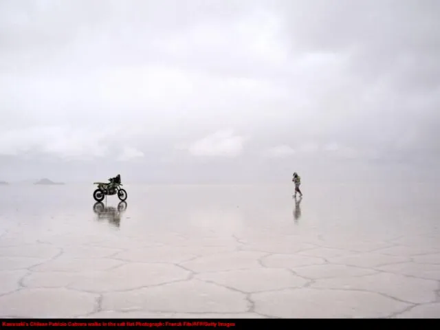 Kawasaki’s Chilean Patricio Cabrera walks in the salt flat Photograph: Franck Fife/AFP/Getty Images