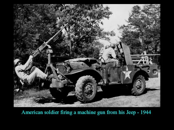 American soldier firing a machine gun from his Jeep - 1944