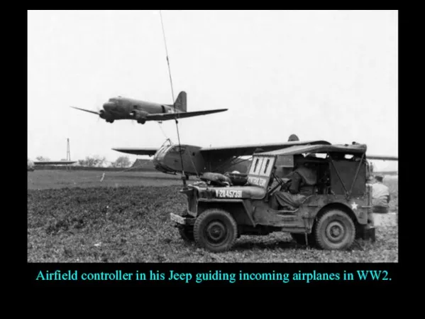 Airfield controller in his Jeep guiding incoming airplanes in WW2.