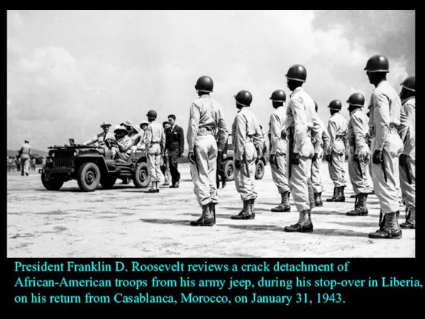 President Franklin D. Roosevelt reviews a crack detachment of African-American troops from