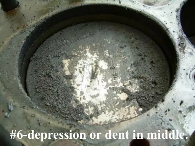 #6-depression or dent in middle.