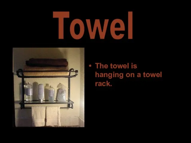 The towel is hanging on a towel rack. Towel