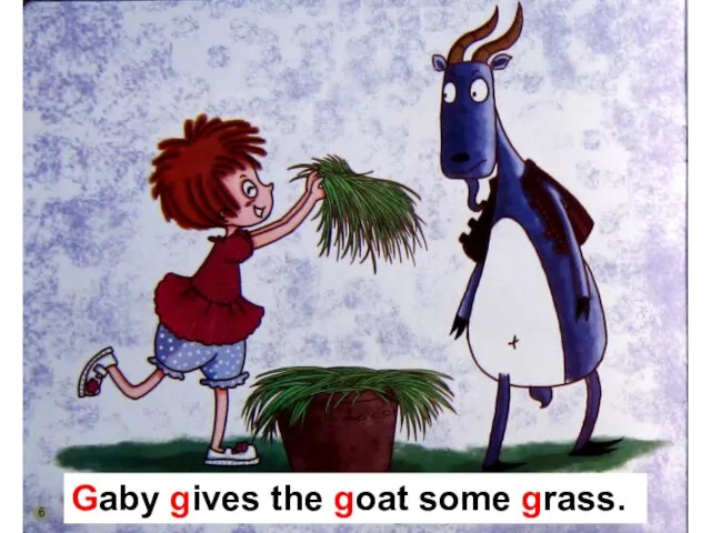 Gaby gives the goat some grass.