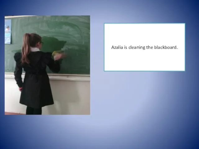 Azalia is cleaning the blackboard.