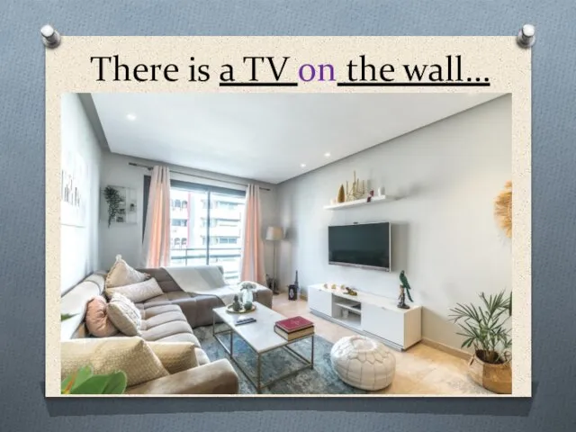 There is a TV on the wall…