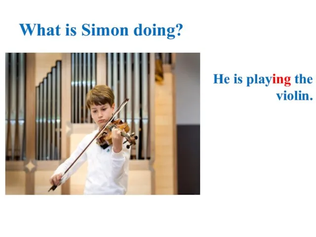 What is Simon doing? He is playing the violin.