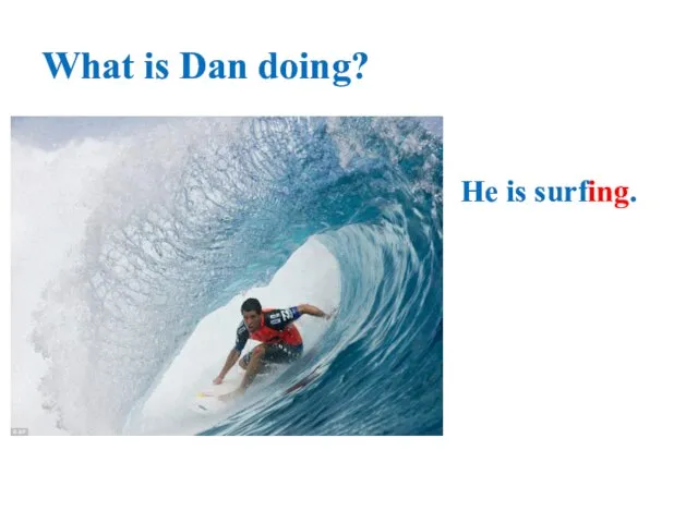 What is Dan doing? He is surfing.