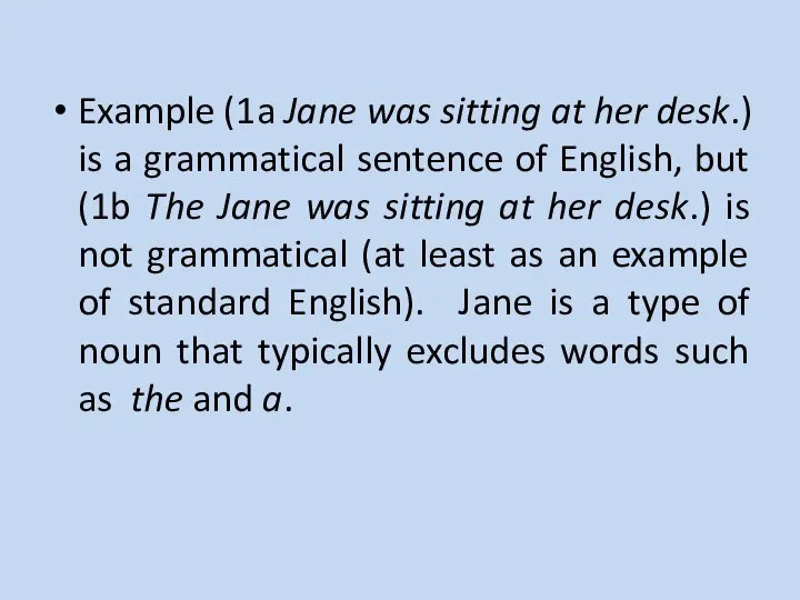 Example (1a Jane was sitting at her desk.) is a grammatical sentence