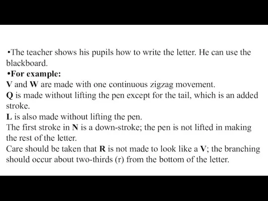 The teacher shows his pupils how to write the letter. He can