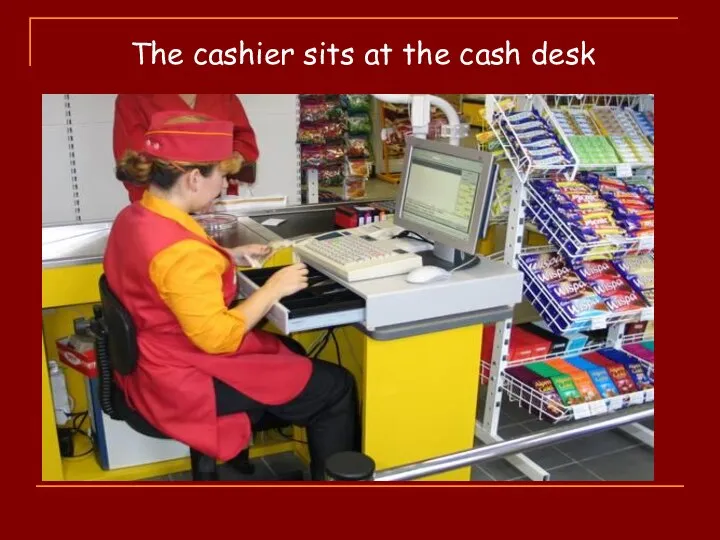 The cashier sits at the cash desk