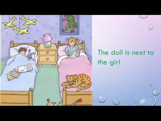 The doll is next to the girl